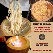 Live Pasta Cooking in a Cheese Wheel At The Wooden Cellar Live Pasta Cooking in a Cheese Wheel At The Wooden Cellar